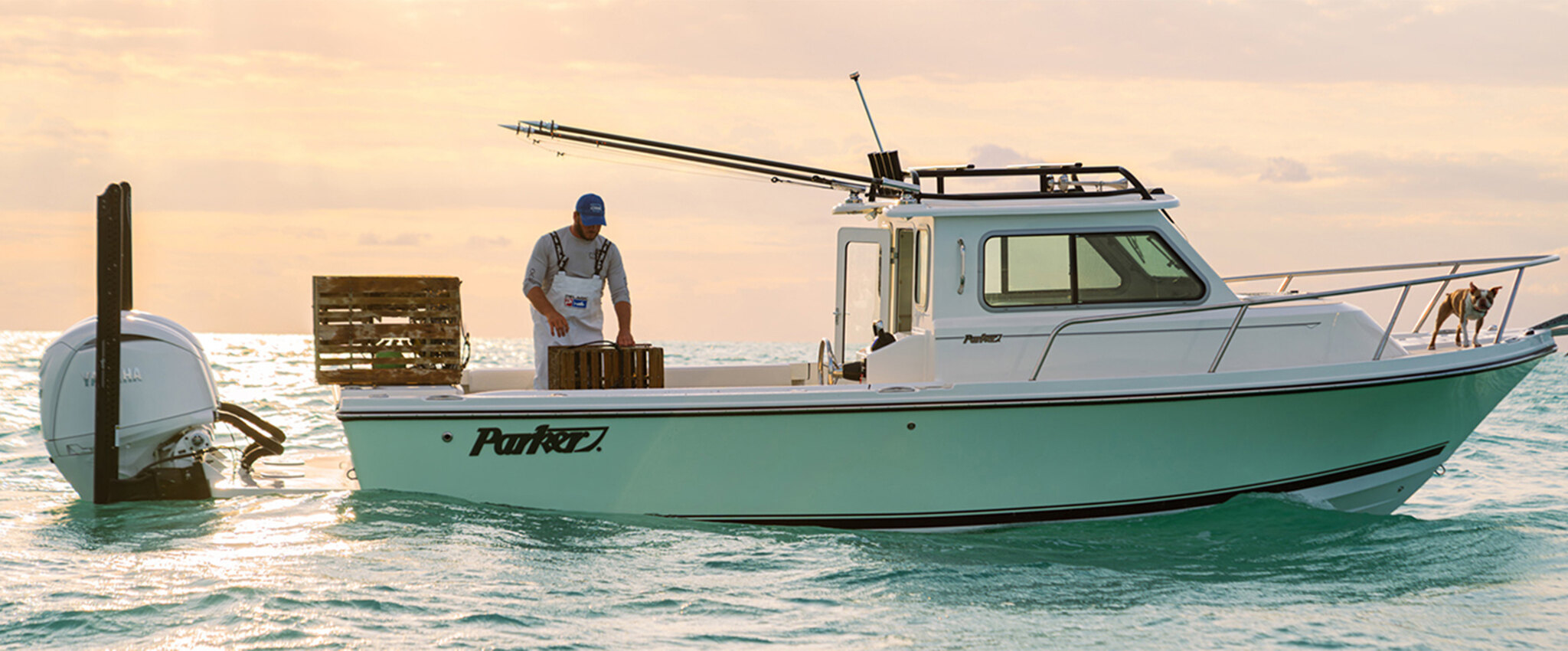 Large boat with people fishing on it in the ocean