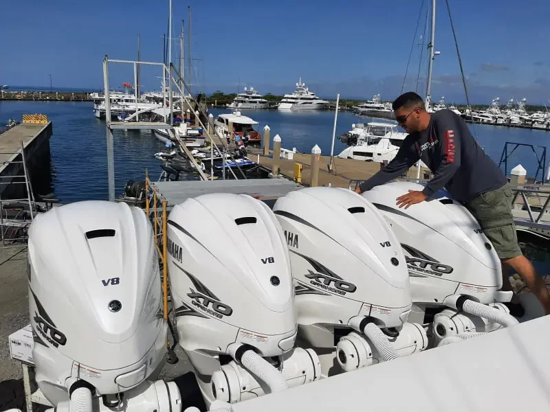 Costa Motor Powersports technician with Yamaha V8 XTO outboards